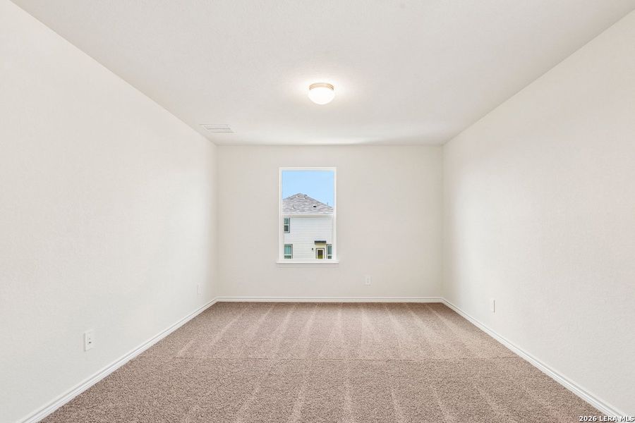 Spacious, unfurnished interior of a new home in Woodside Farms, Seguin (Image 24).