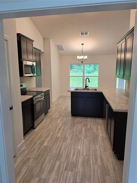 Furnished interior view inside a new home in Spring Hill, Spring Hill (Image 5). Furnished interior view inside a new home in Spring Hill, Spring Hill (Image 5).