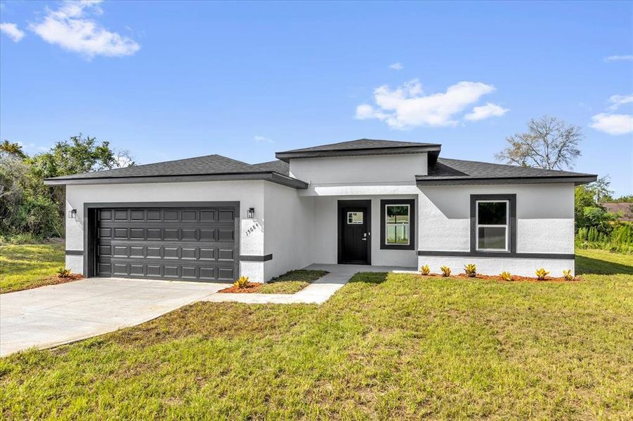 Front exterior of a new home in , Ocala, FL, highlighting curb appeal (Image 20).