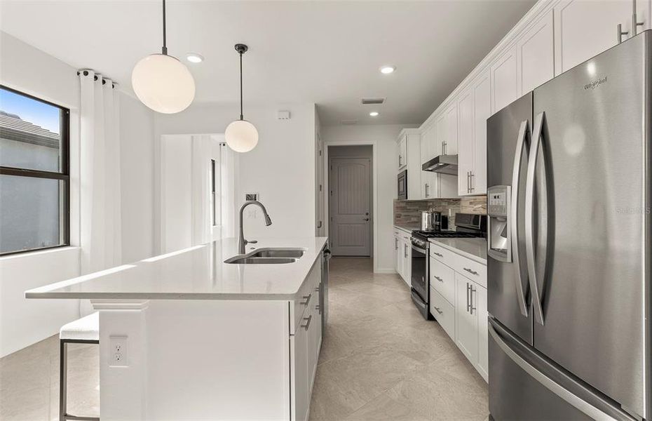 Furnished interior view inside a new home in Arbor Oaks, North Port (Image 7).