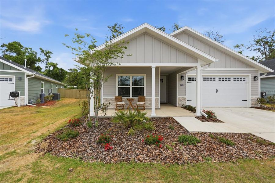 Front exterior of a new home in , Gainesville, FL, highlighting curb appeal (Image 27).