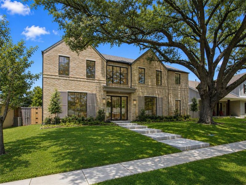 Front exterior of a new home in , Dallas, TX, highlighting curb appeal (Image 25).