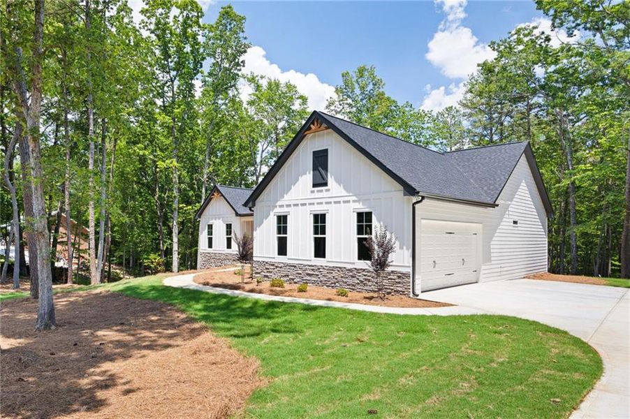 Front exterior of a new home in , Adairsville, GA, highlighting curb appeal (Image 14). Front exterior of a new home in , Adairsville, GA, highlighting curb appeal (Image 14).