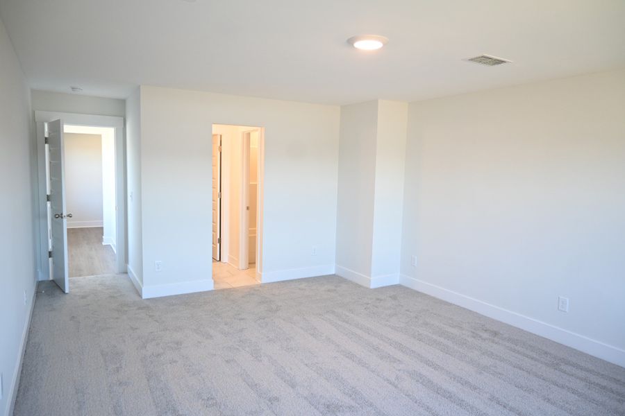 Spacious, unfurnished interior of a new home in Rookers Bend, Smyrna (Image 31).