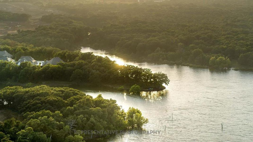 Water view featuring a heavily wooded area Water view featuring a heavily wooded area