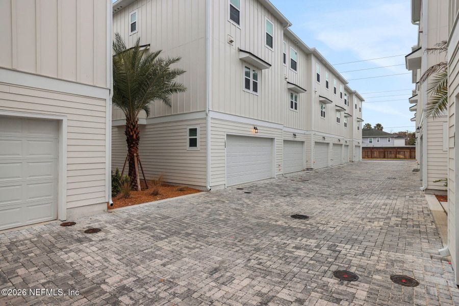 Exterior details and patio area of a home in North Beach Townhomes, Jacksonville Beach (Image 24).