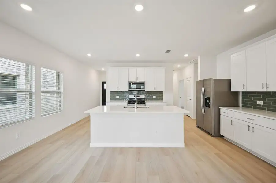 Photo is not of the actual home, but is an inspirational photo of builder’s model home and may depict options, furnishings, and/or decorator features that are not included.