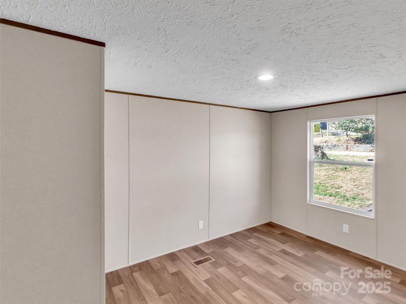 Spacious, unfurnished interior of a new home in , Waynesville (Image 21).