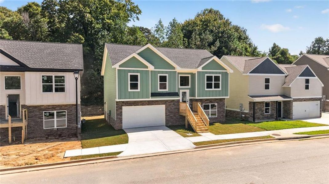 Front exterior of a new home in , Gainesville, GA, highlighting curb appeal (Image 23).