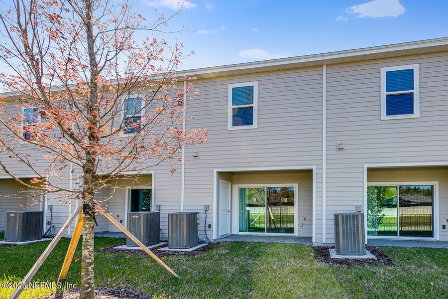 Front exterior of a new home in Sabal Terrace, Jacksonville, FL, highlighting curb appeal (Image 21). Front exterior of a new home in Sabal Terrace, Jacksonville, FL, highlighting curb appeal (Image 21).