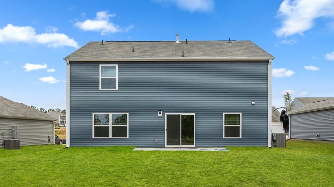 Exterior details and patio area of a home in Lakestone, Woodruff (Image 22).