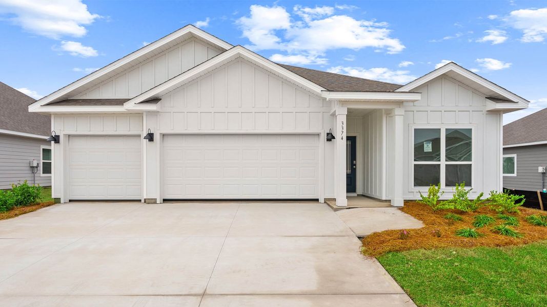 Front exterior of a new home in Hodges Bayou Plantation, Panama City, FL, highlighting curb appeal (Image 1). Front exterior of a new home in Hodges Bayou Plantation, Panama City, FL, highlighting curb appeal (Image 1).
