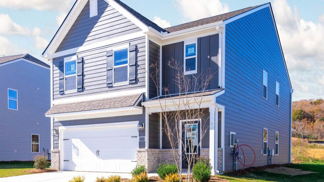 Front exterior of a new home in Prairie Pass, Apison, TN, highlighting curb appeal (Image 2).