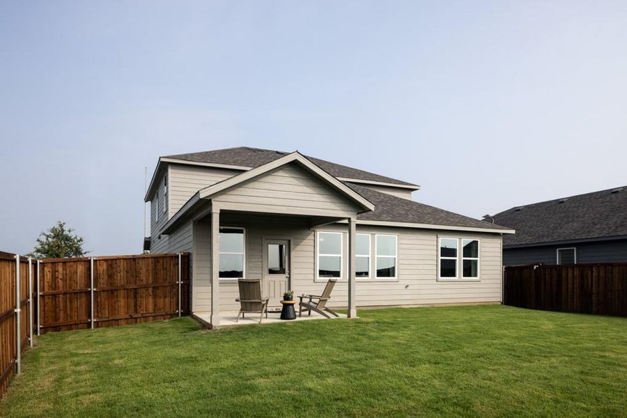 Front exterior of a new home in River Ridge, Crandall, TX, highlighting curb appeal (Image 21). Front exterior of a new home in River Ridge, Crandall, TX, highlighting curb appeal (Image 21).