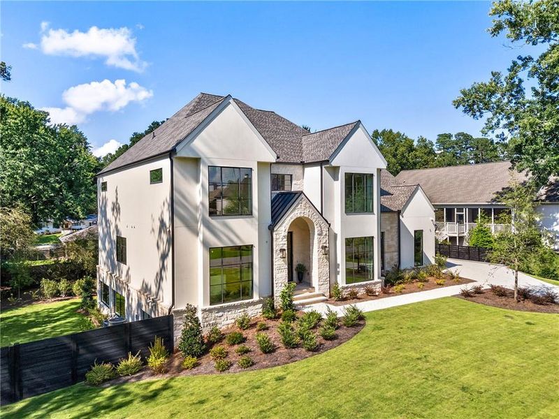 Front exterior of a new home in , Alpharetta, GA, highlighting curb appeal (Image 30). Front exterior of a new home in , Alpharetta, GA, highlighting curb appeal (Image 30).