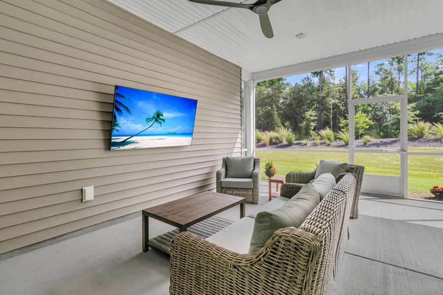 Exterior details and patio area of a home in Summerwind Crossing at Lakes of Cane Bay, Summerville (Image 26).