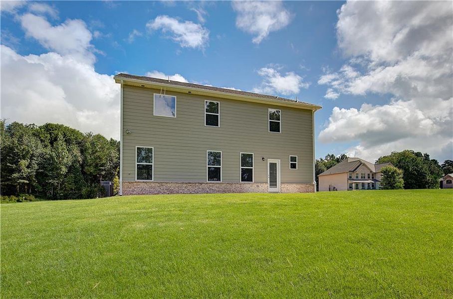 Front exterior of a new home in Westminster, Covington, GA, highlighting curb appeal (Image 12).