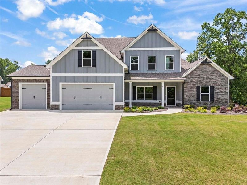 Front exterior of a new home in , Dallas, GA, highlighting curb appeal (Image 1). Front exterior of a new home in , Dallas, GA, highlighting curb appeal (Image 1).