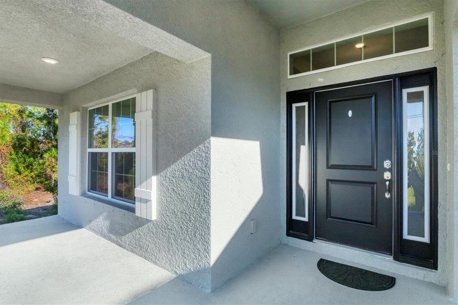 Exterior details and patio area of a home in , Port Charlotte (Image 28). Exterior details and patio area of a home in , Port Charlotte (Image 28).