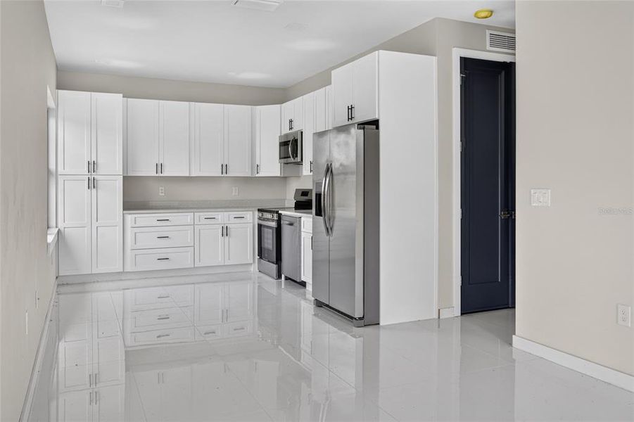 Furnished interior view inside a new home in , Orlando (Image 6). Furnished interior view inside a new home in , Orlando (Image 6).