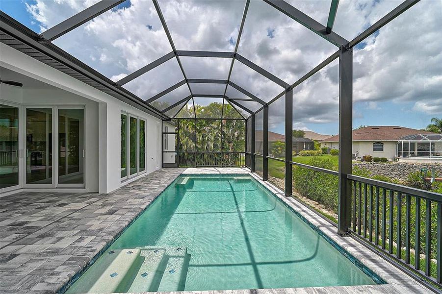 Exterior details and patio area of a home in , North Port (Image 41).
