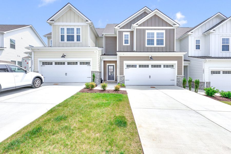 Front exterior of a new home in Harvest Point, Spring Hill, TN, highlighting curb appeal (Image 1). Front exterior of a new home in Harvest Point, Spring Hill, TN, highlighting curb appeal (Image 1).