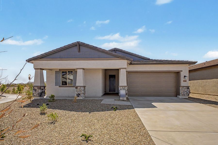 Front exterior of a new home in Frontera, Surprise, AZ, highlighting curb appeal (Image 1). Front exterior of a new home in Frontera, Surprise, AZ, highlighting curb appeal (Image 1).