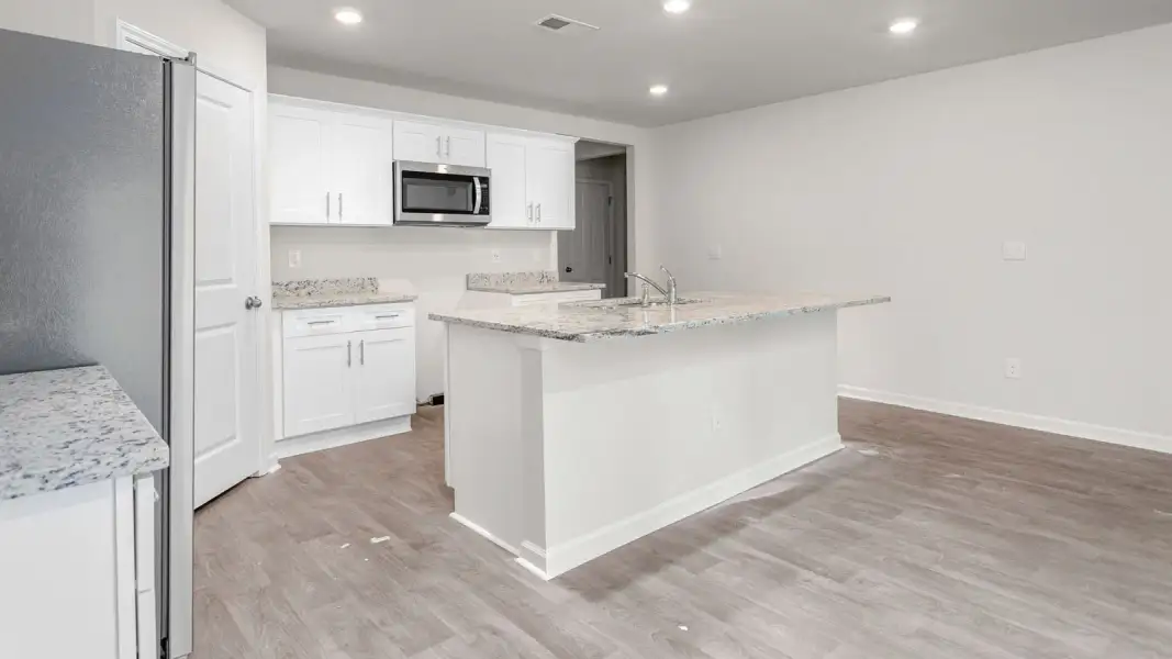 Furnished interior view inside a new home in Madison Gardens, Lexington (Image 6).
