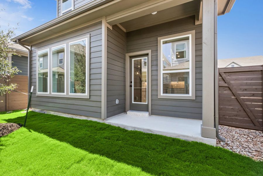 Exterior details and patio area of a home in Double Creek Crossing – City Home Series, Round Rock (Image 3). Exterior details and patio area of a home in Double Creek Crossing – City Home Series, Round Rock (Image 3).