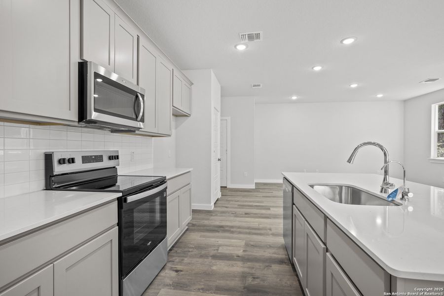 Furnished interior view inside a new home in Rosemont Hill, San Antonio (Image 6).