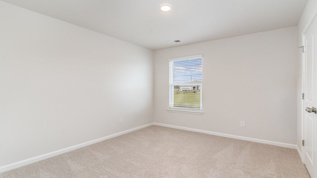 Representative unfurnished interior of a home built from the CAMERON by D.R. Horton in The Reserve at Wild Horse, Conway (Image 7).