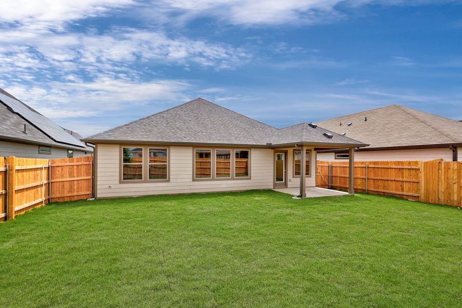 Exterior details and patio area of a home in Prairie Winds, Hutto (Image 21).