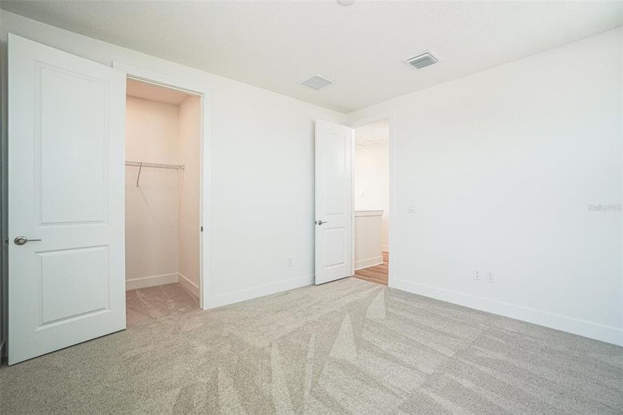 Spacious, unfurnished interior of a new home in Lagoon Residences at Epperson, Wesley Chapel (Image 26).