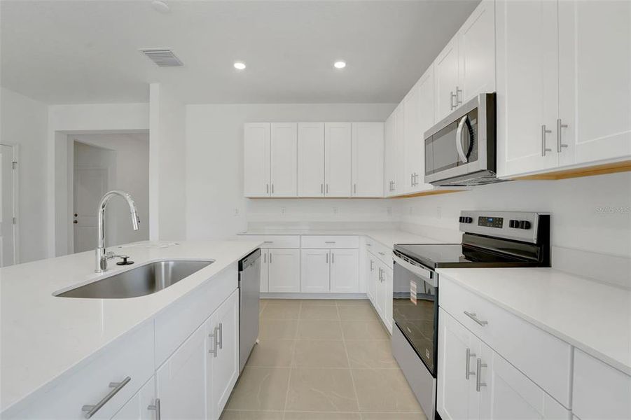 Furnished interior view inside a new home in Willowbrook North, Winter Haven (Image 8).