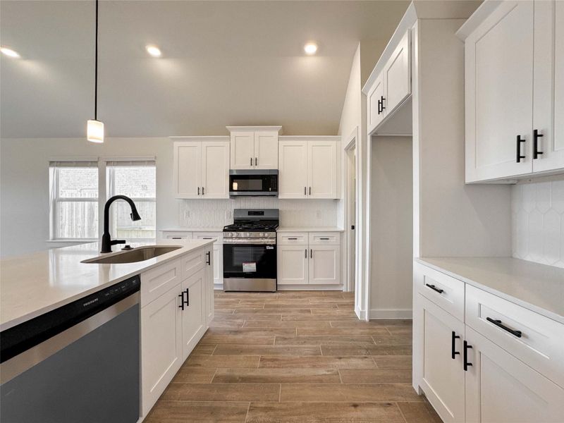 Furnished interior view inside a new home in , Manvel (Image 9).
