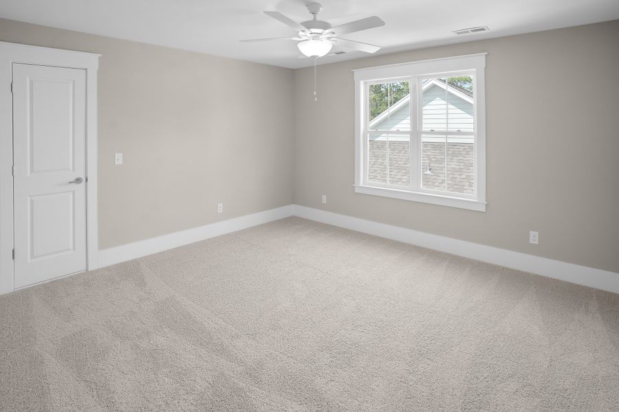 Spacious, unfurnished interior of a new home in Osprey Landing, Southport (Image 36).