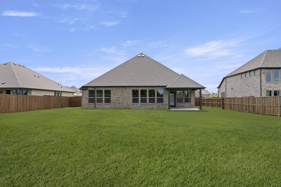 Exterior details and patio area of a home in Lovers Landing, Forney (Image 4). Exterior details and patio area of a home in Lovers Landing, Forney (Image 4).