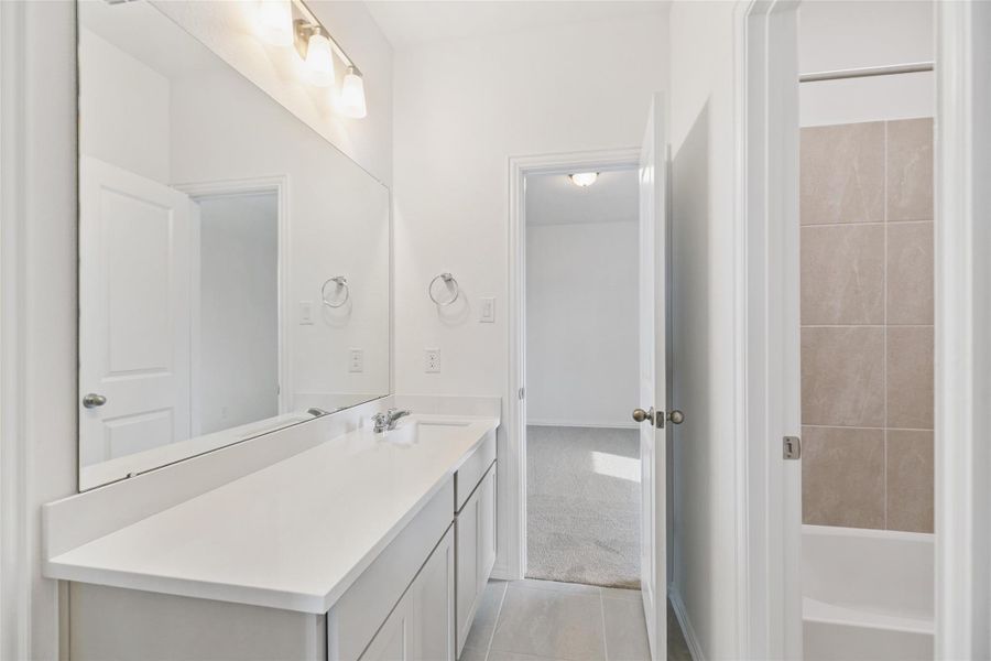 Furnished interior view inside a new home in Aldeana, Bonney (Image 12).