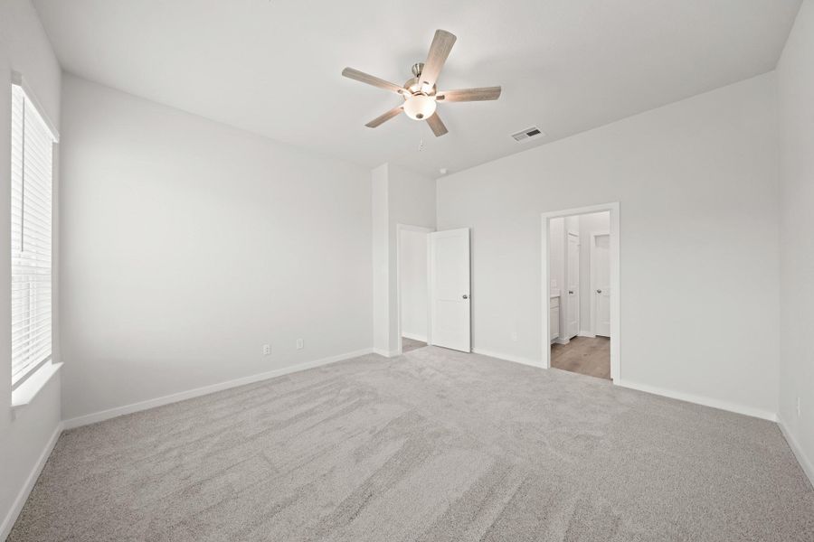 Spacious, unfurnished interior of a new home in Creekland Village at Bridgeland, Cypress (Image 21).