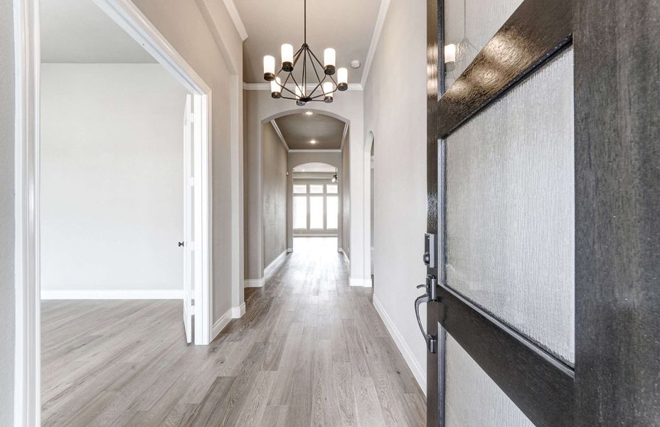 Representative unfurnished interior of a home built from the 2870 by Ravenna Homes in The Woodlands Hills 65′, Willis (Image 18). Representative unfurnished interior of a home built from the 2870 by Ravenna Homes in The Woodlands Hills 65′, Willis (Image 18).