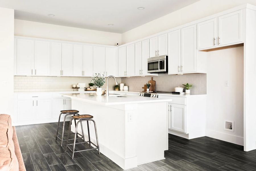 Representative furnished interior of a home built from the The Summerville 50's by AHA Dream Homes, LLC in Whisper Valley, Manor (Image 14). Representative furnished interior of a home built from the The Summerville 50's by AHA Dream Homes, LLC in Whisper Valley, Manor (Image 14).