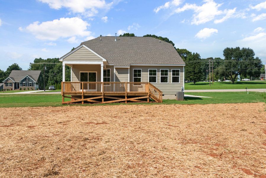 Front exterior of a new home in Redland, Advance, NC, highlighting curb appeal (Image 22). Front exterior of a new home in Redland, Advance, NC, highlighting curb appeal (Image 22).