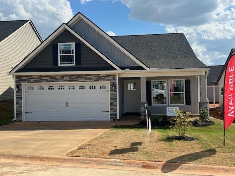 Front exterior of a new home in Cleveland Meadows, Spartanburg, SC, highlighting curb appeal (Image 1).