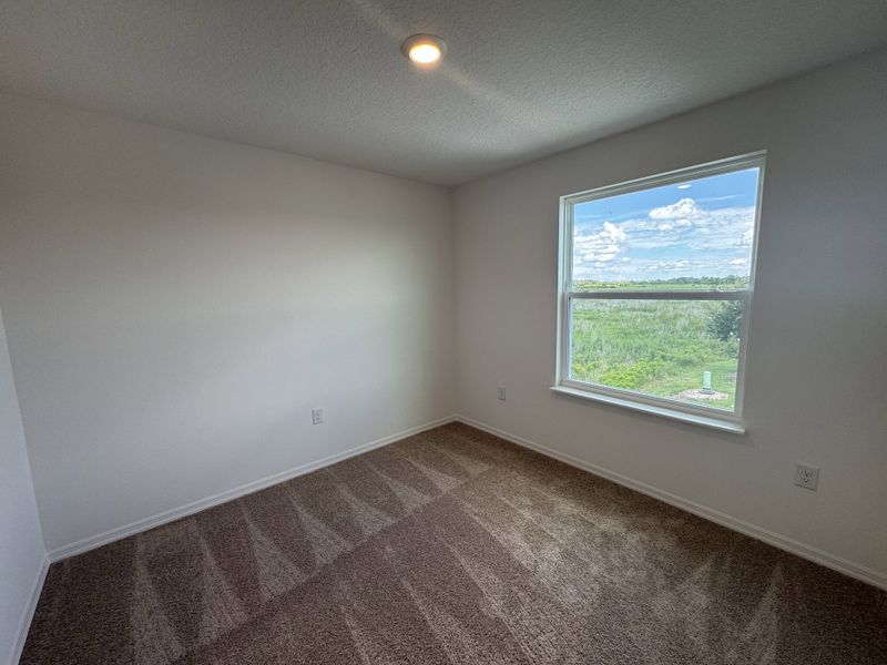 Spacious, unfurnished interior of a new home in Lake Deer Estates, Poinciana (Image 15).