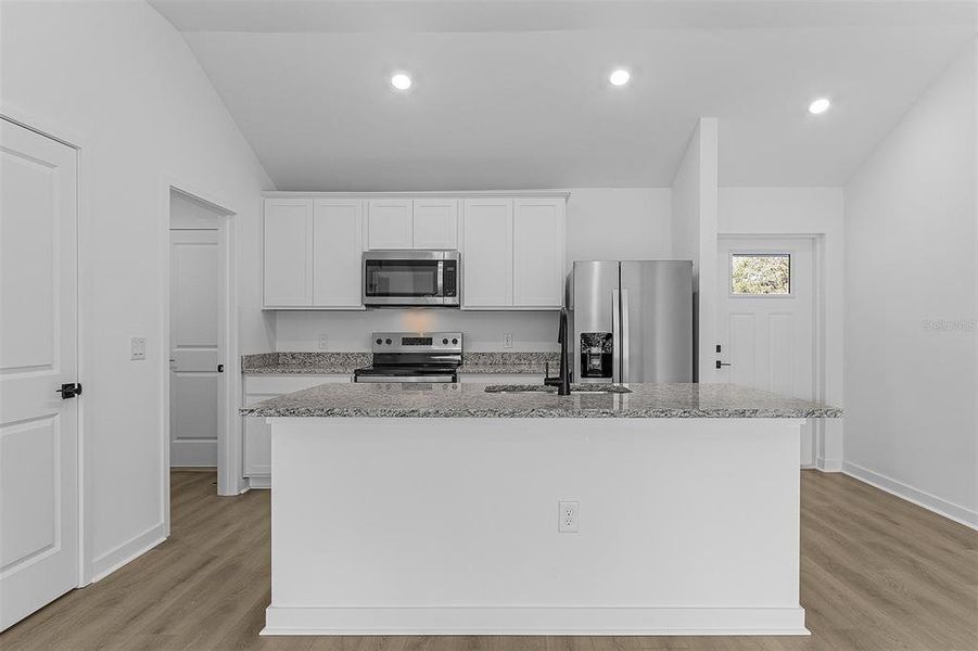 Furnished interior view inside a new home in , North Port (Image 8).