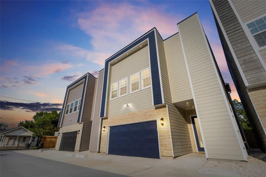 Every day starts with pride as you pull up to your modern two-story home, its bold navy accents and stonework setting the stage for a lifestyle that’s as stylish as it is comfortable. The sleek lines of your façade give your place a fresh, standout curb appeal.