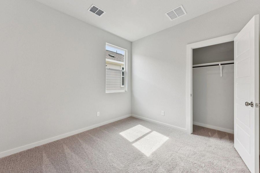 Spacious, unfurnished interior of a new home in Stallion Run, Buda (Image 22).
