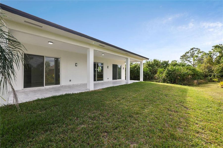 Exterior details and patio area of a home in , Rotonda West (Image 24).