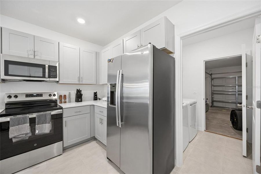 Furnished interior view inside a new home in Westview Community Group Page, Kissimmee (Image 17).