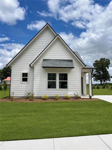 Front exterior of a new home in , Carrollton, GA, highlighting curb appeal (Image 1). Front exterior of a new home in , Carrollton, GA, highlighting curb appeal (Image 1).
